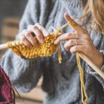 close-up-on-womans-hands-knitting-lukatdb