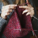 1-close-up-on-womans-hands-knitting-lukatdb