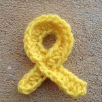 A-completed-crochet-cancer-awareness-ribbon-for-sarcoma