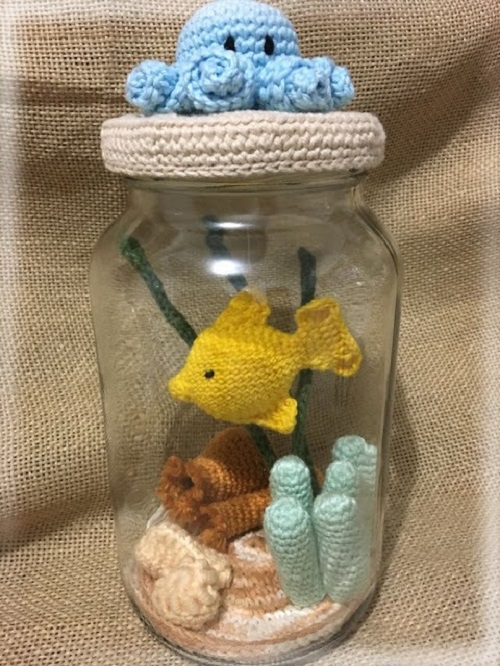 Yellow Fish In Bottle Aquarium